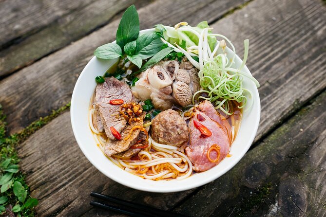 12 Tasting Street Food & Sightseeing By Scooter with Student - Thich Quang Duc Monument: History With a Short, Human Pause