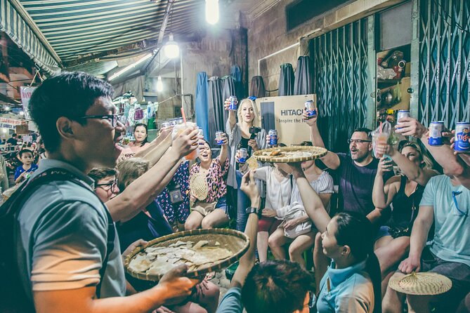 12 Tasting Street Food & Sightseeing By Scooter with Student - District 4 and Xóm Chiếu Market (Market 200): Snack Culture in Motion