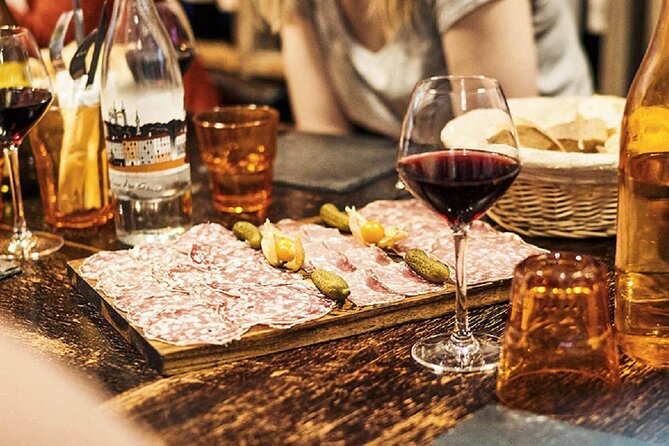 Afternoon Old Town Food tour - Cold cuts and red wine: the first savory hit
