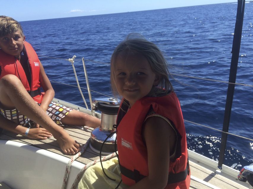 Alcudia: Sailing Yacht Excursion with Wine & Tapas - Small-group reality checks: wind and last-minute changes