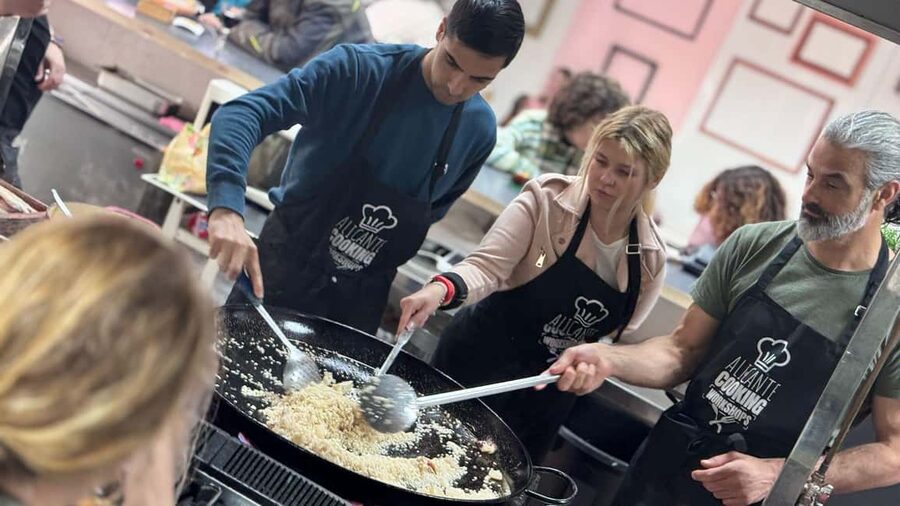 Alicante: Paella & Sangria Class with Tapas and Market Visit - Cooking in a real restaurant kitchen, not a made-for-tour space