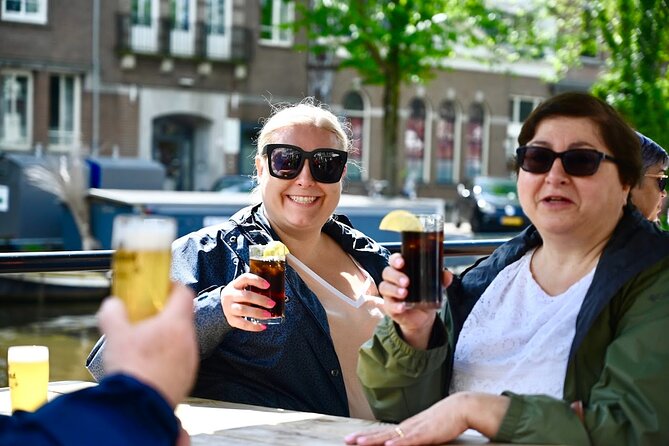 Amsterdam Food Tour of 10+ Local Classic Tastings in Jordaan Area - Fishmongers, herring, and kibbeling: the salty side of Amsterdam
