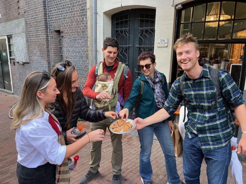 Amsterdam: Food Tour with Drinks by Spui, Canals and Jordaan - UNESCO canal belt bites: herring, bitterballen, and a possible jenever shot