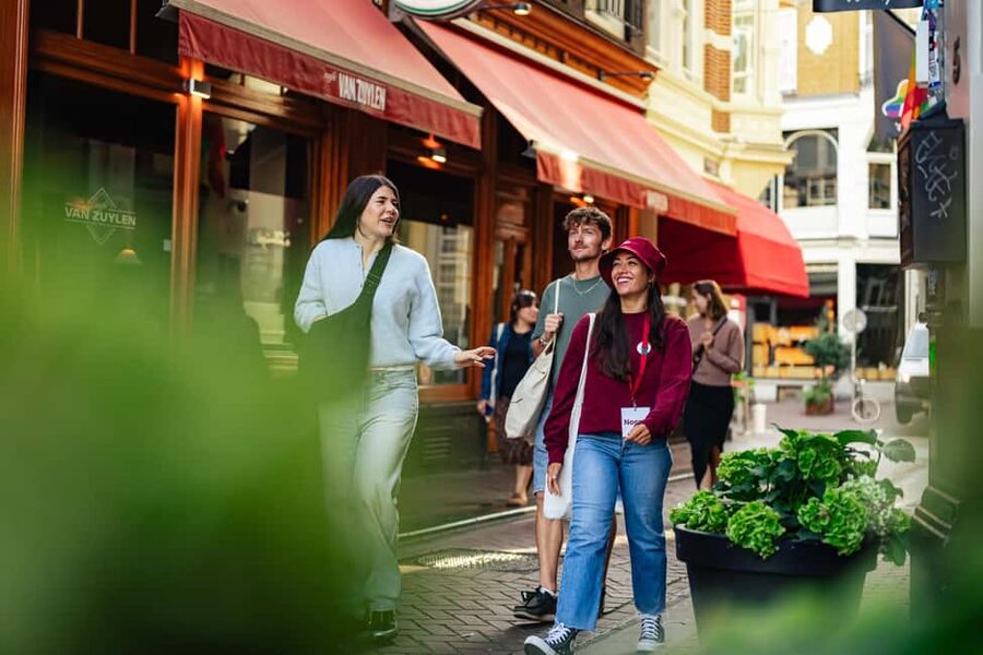 Amsterdam: Guided Cultural Food Tour in English or German - Beurs van Berlage and Magna Plaza: architecture stops that explain how Amsterdam thinks