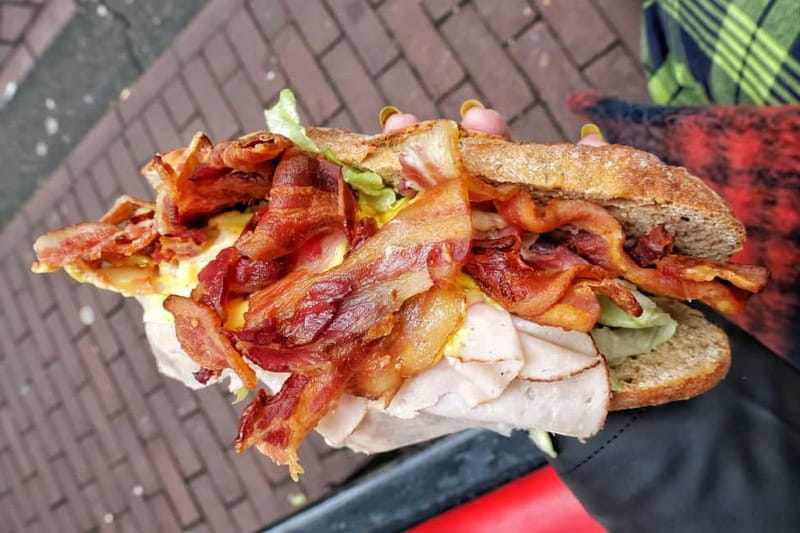 Amsterdam: Guided Food Tour with Tastings - Walking vs Cycling: What Changes on Weekends and Rainy Days