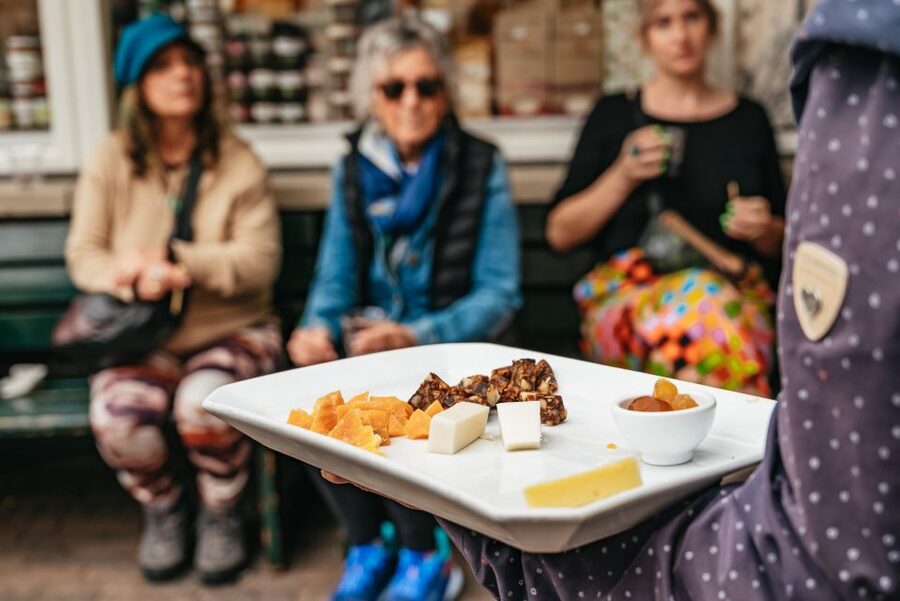 Amsterdam: Jordaan District Local Food Walking Tour - Jordaan, canals, and your first snack stop
