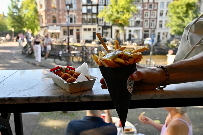 Amsterdam Private Food & Drinks Tour by UNESCO Canals & Jordaan - Herring stall Jonk and the 16:00 cut-off