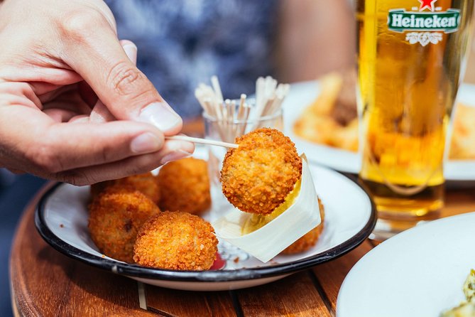 Amsterdam Private Food Tour with Local Including 6 or 10 Tastings - De Pijp flavors, the Banksy-area curiosity, and a drink break