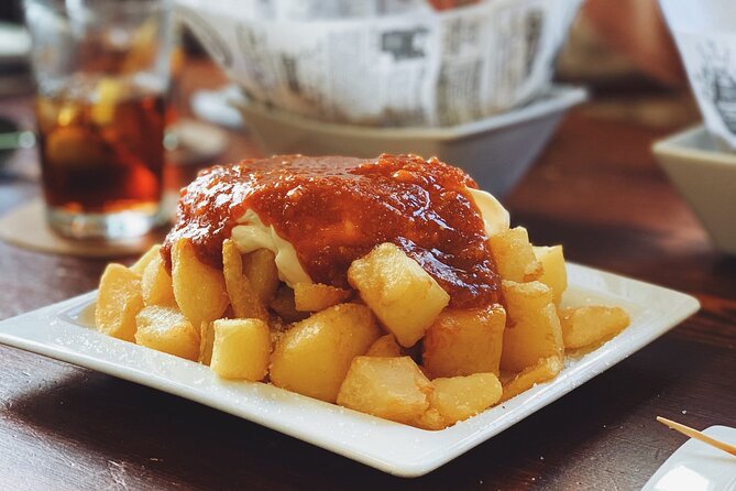 Barcelona Food Tour: Tapas, Drinks and Delights with a Local - Plaça de Sant Josep Oriol: small square, big snack energy