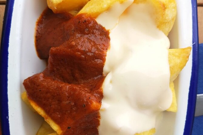 Barcelona Food Tour: Tapas, Drinks and Delights with a Local - Plaça Sant Jaume: Crema Catalana and a turron-flavored finish