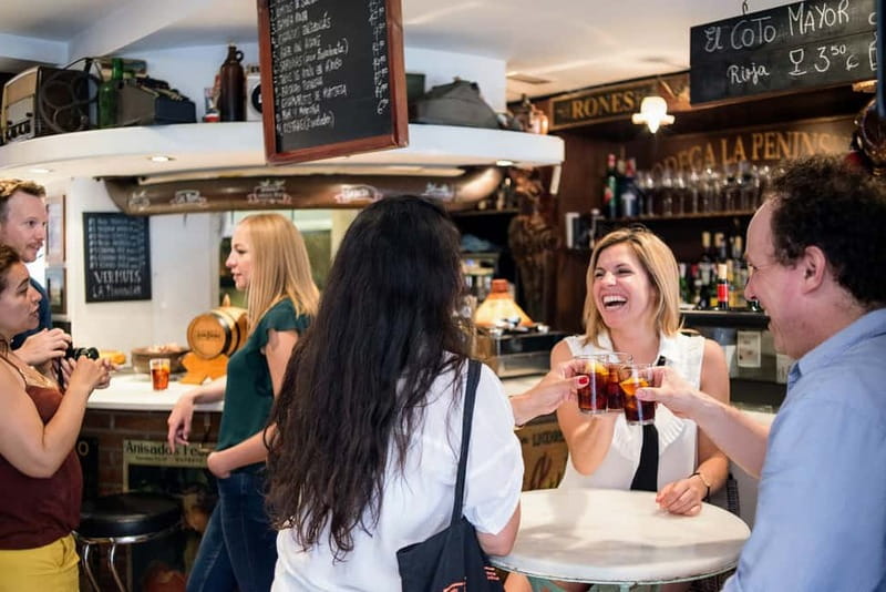 Barcelona: Hidden Markets, Tapas & Paella Food Tour - Paella in a former winery: what to focus on at the table