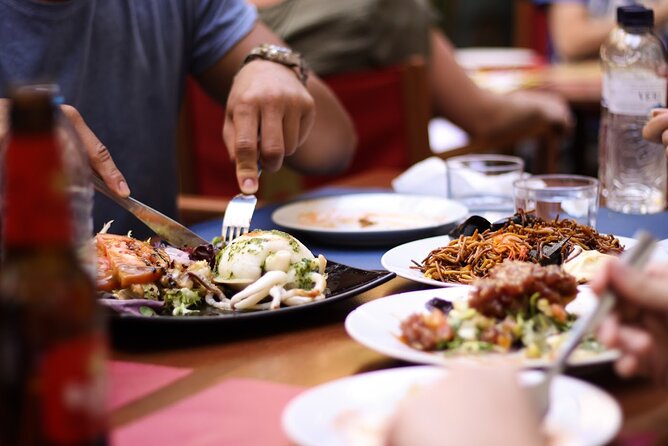 Barcelona Private Food Tour: Tapas, Paella & 8+ Food Tastings - How the guides make the food feel local (Miguel and Muriel stand out)