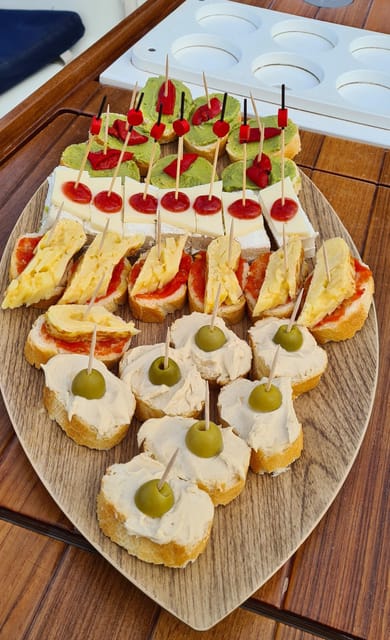 Barcelona: Sailing Tour with Spanish Tapas and Drinks - Why this 2-hour sail feels like a smart Barcelona move