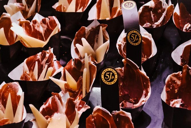 Barcelona Tapas Walking Tour: Food, Wine & History - What you’ll eat and drink: the real value is the pacing