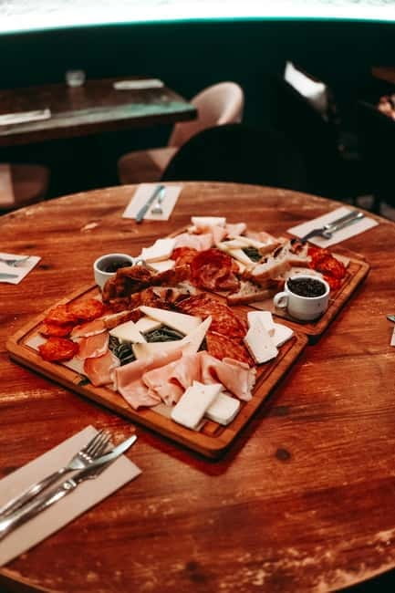 Barcelona: Tipsy Tapas & History Tour in the Gothic Quarter - Stop 3: The Gothic Quarter Guided Walk Turns Alleys into Stories