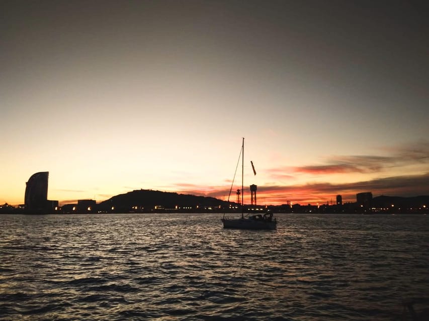 Barcelona: Unique Sunset Sailing Tour with Tapas & Open Bar - From Port Olímpic to open water: what the start feels like