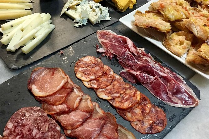 Barcelona Wine and Gourmet Tapas Tour - Wine and spirits: expect pairings, not just a drink voucher
