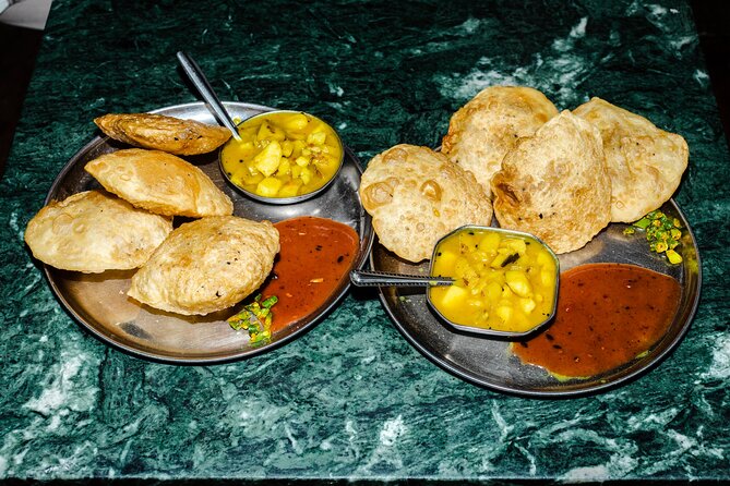 Bengali Nights Kolkata Food Tour with 13+ Tastings - Stop 2: Seafood focus with chingri coconut cream and banana-leaf fish mousse