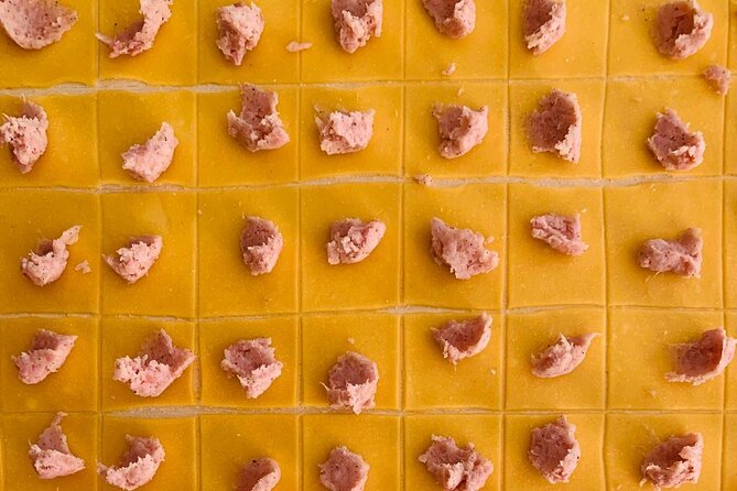 Bologna Food Tour and Enogastronomia Experience with Local Chef - Quadilatero market walk: seasonal bites and salumi e formaggi