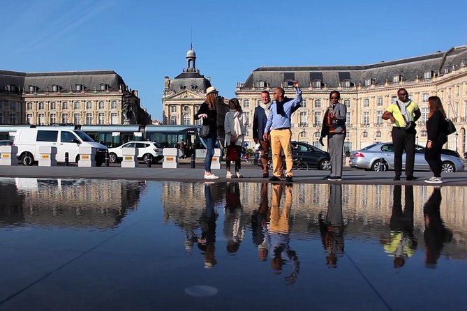 Bordeaux Historic and Gourmet Food Walking Tour - What you actually eat and drink: cannelé, cheese, dry ham, and wine