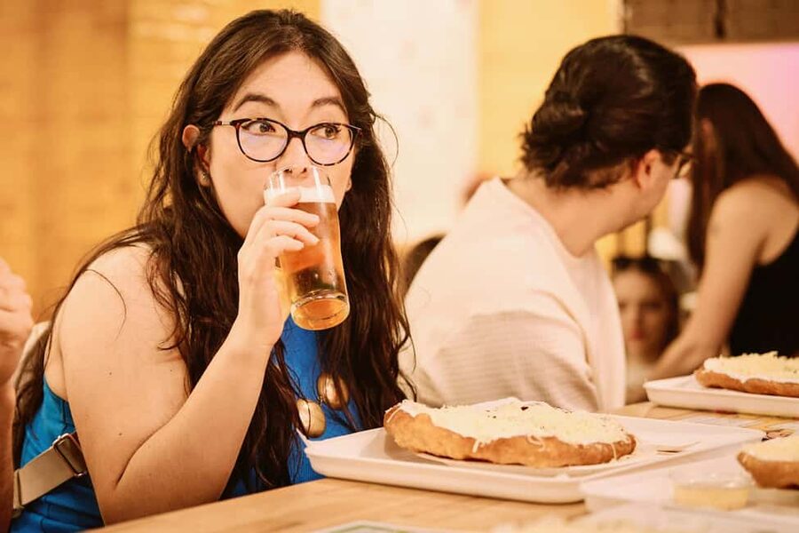 Budapest: Guided Street Food Tour with Sweet Wine - Stop one: street food comfort, with Lángos and traditional soup