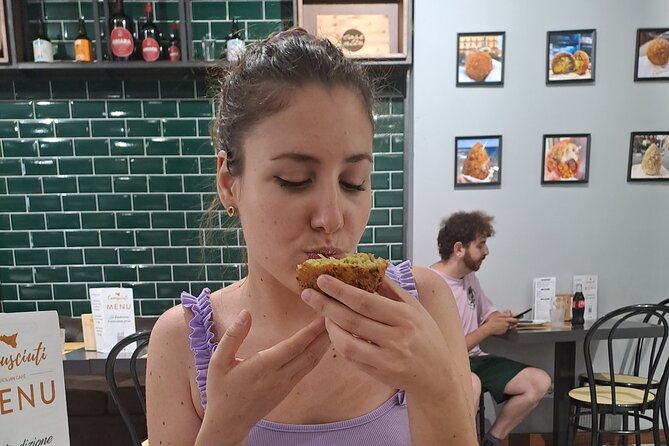 Catania Sicilian Street Food Tour: Small Group by Do Eat Better - Stop 2: Catania Fish Market and the fried fish cone moment
