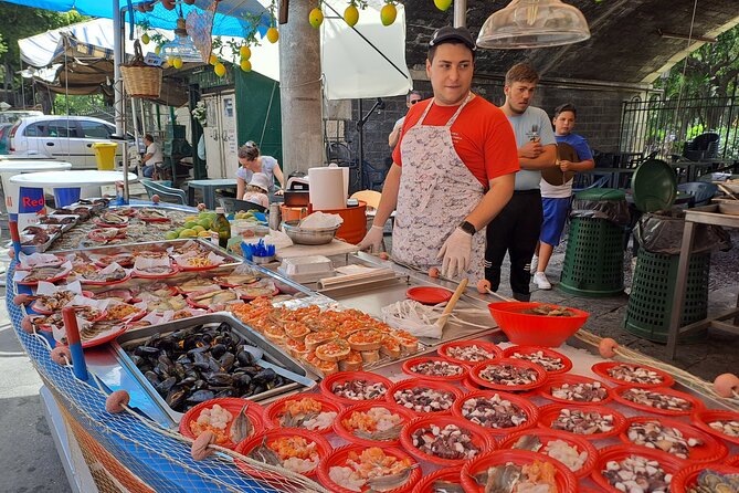 Catania Sicilian Street Food Tour: Small Group by Do Eat Better - Stop 4: Piazza Stesicoro and cartocciata—small, tall, and airy