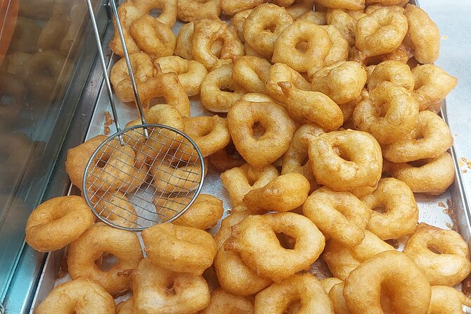 Classic Athens Food Tour with Local Drink & Market Visit - First tastings: bakery street food that sets the tone