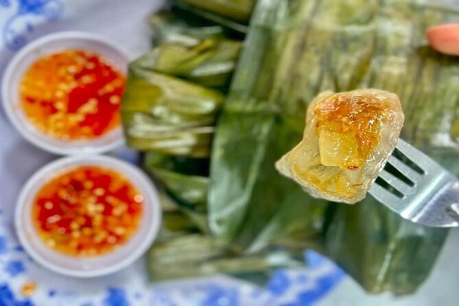 DaNang Night Foodie Tour-Sighseeing with Aodai Lady Rider Private - Dragon Bridge, Love Lock Bridge, and Han River lights on one night loop