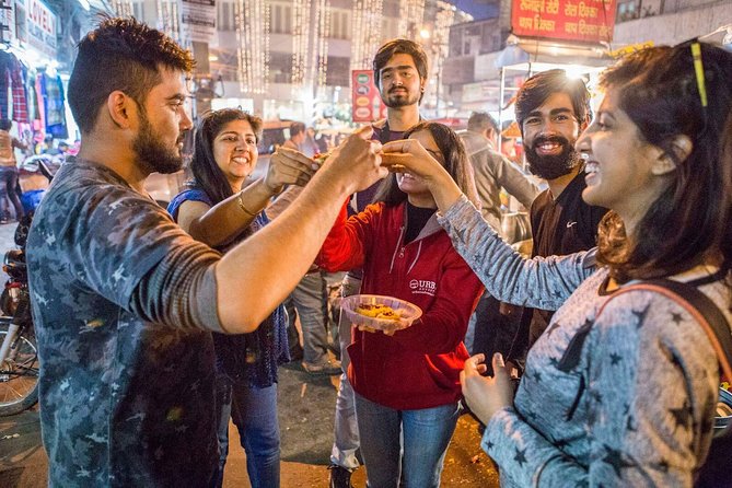 Delhi Food Walk: Rickshaw Ride, Street Eats & Market Tour - Temple stop and rickshaw ride: culture first, then food