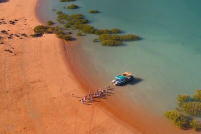 DINOSAUR ADVENTURE CRUISE - With Beachside Tapas and Cocktails - Getting there: pickup, small-group timing, and the wet-landing reality