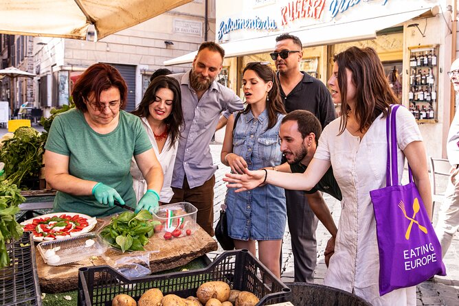 Eternal Rome Food Tour: Campo de Fiori, Jewish Ghetto, Trastevere - Taverna del Ghetto: fried cod, supplì, and white wine