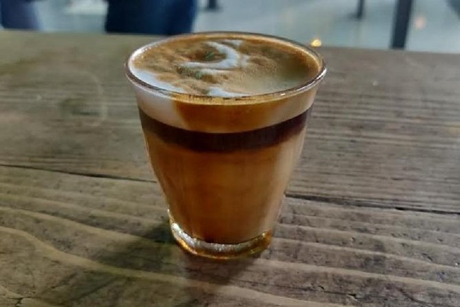 Ethiopian Culinary Tour - Market, Food, Coffee Ceremony & more - Tomoca Coffee stop: taste and take home beans