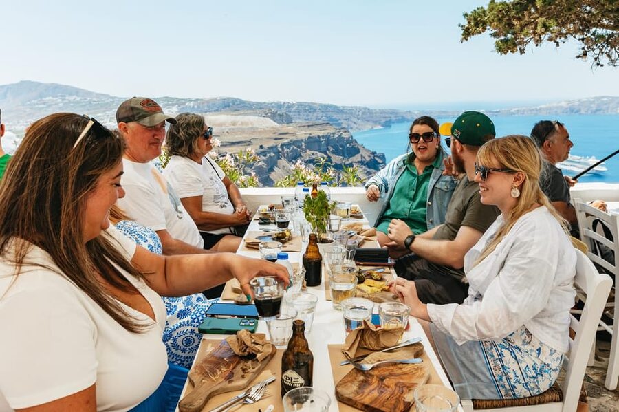 Fira: Guided Foodie Walking Tour with Tastings - Mezes in a Traditional Tavern: The First Taste Sets the Tone