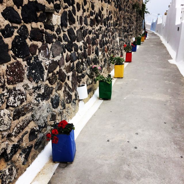Fira: Guided Foodie Walking Tour with Tastings - Market Time in Fira: Fresh Fish, Vegetables, and What’s in Season