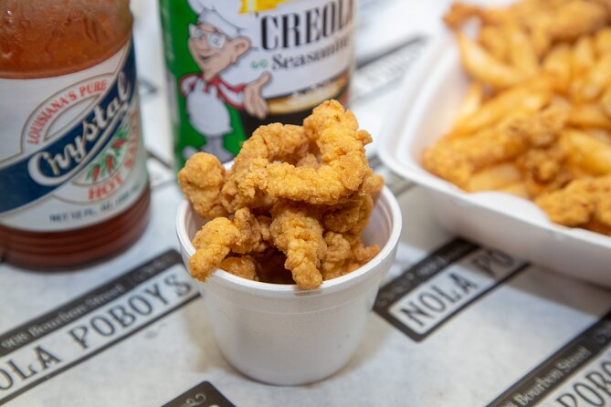 French Quarter walking Food Tour Famous Flavors of New Orleans - French Market Meetup: Where Your French Quarter Food Story Starts