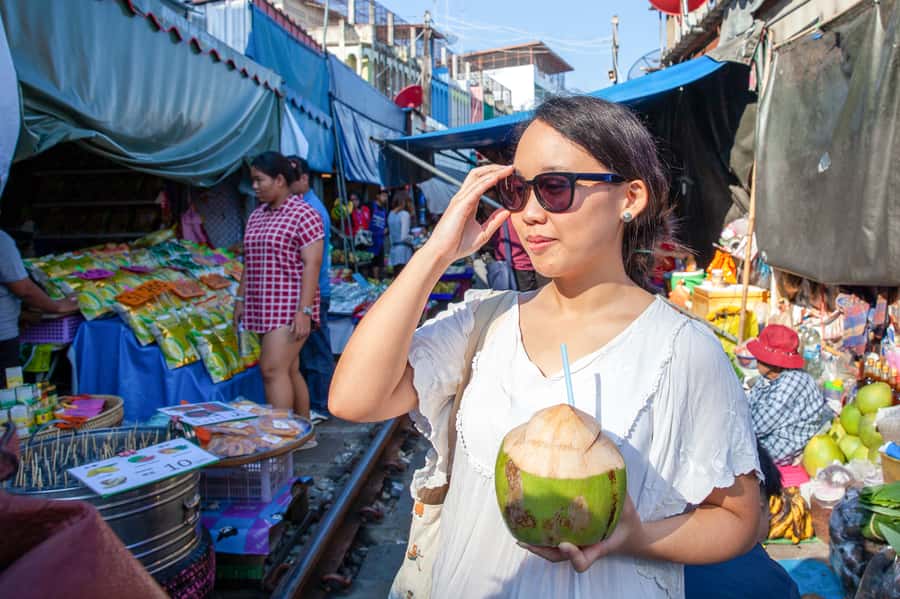 From Bangkok: Maeklong Railway and Floating Market Food Tour - Damnoen Saduak Floating Market: Boats, Snacks, and the Real Trade-Off