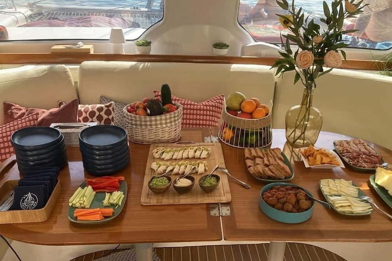From Palma: Luxury Catamaran Group Tour with Tapas & Drinks - How the 4-Hour Sail Works: From Palma Coast Views to a Swim Bay