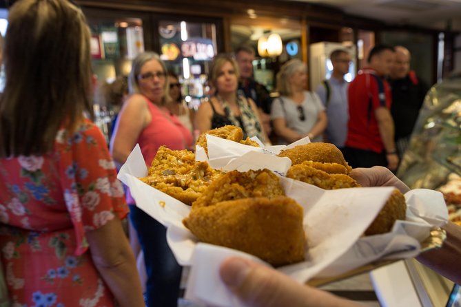Gastronomic Street Food Tour of Catania - Piazza Stesicoro and the Roman Amphitheater Setting