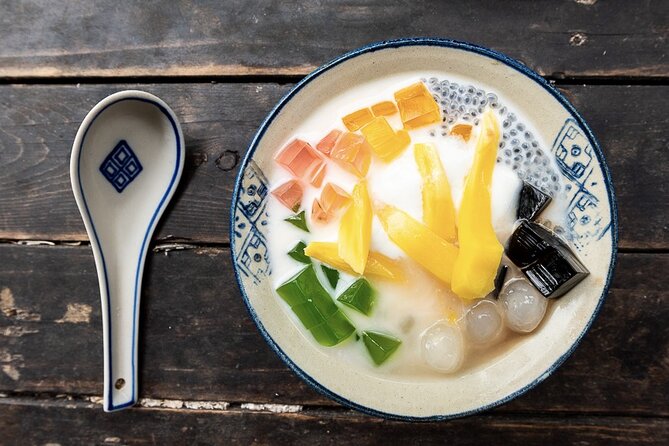 Hanoi Street Food Tour By Motorbike + Sightseeing SAFE & FUN - Train Street Coffee: the grand finale with a built-in show