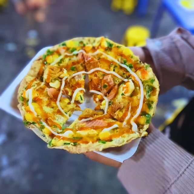 Ho Chi Minh City: Food Tour by Scooter with Eleven Tastings - The first bites: banana sticky rice, then your mini Bánh xèo