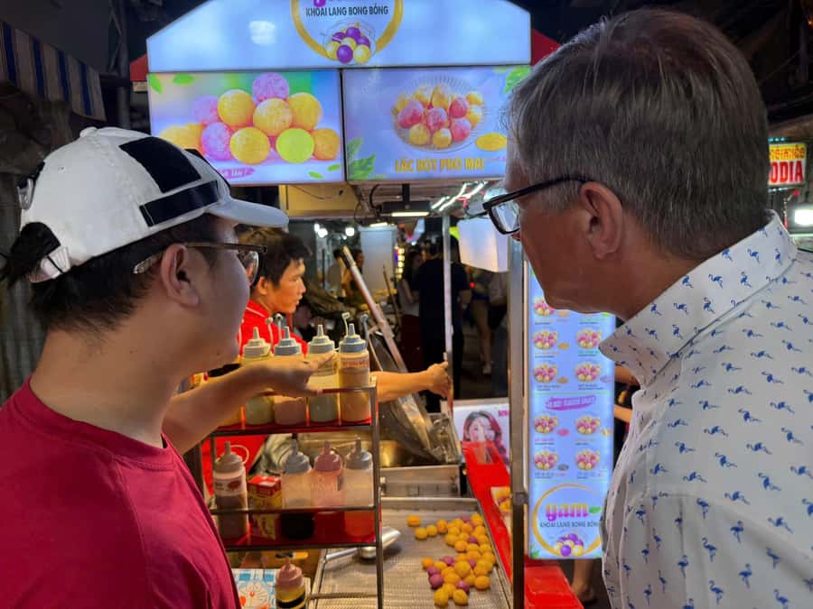 Ho Chi Minh: Local Food Tour by Scooter with Vegan Option - Stop 3: night market mode with skewers, sweet potato balloons, and banana leaf cake