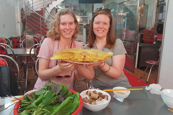 Ho Chi Minh Private Half Day Street Food Tour with Local Students - The Ride Through District 3 and City Contrasts