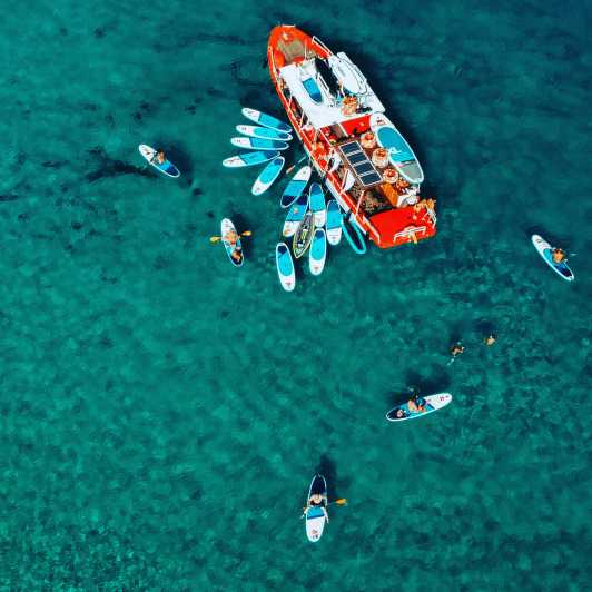 Ibiza: Secret Coves Guided Boat Tour with Open Bar and Tapas - A boat that turns Ibiza’s west coast into a playground