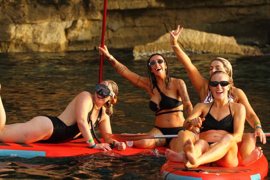 Ibiza: Sunset Boat Tour with Water Sports, Open Bar & Tapas - Sailing the northwest scenery: Cala Bassa and the view stops
