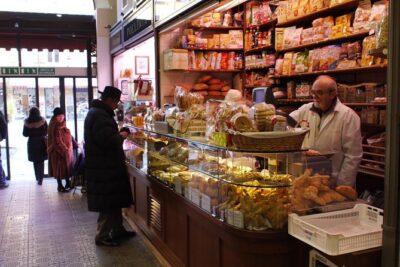 Intimate Modena Food Tour: Market & Local Secrets (Max 8) - Mercato Albinelli: aged Parmigiano Reggiano in a place that smells like work