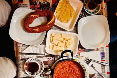 Istanbul Guided Street Food Tour Around European and Asian Sides - Dairy-Store Breakfast: Kaymak, Honey, Cheese, and Simit