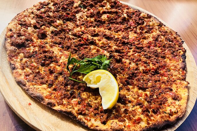 Istanbul Kadikoy Food Tour with 12+ Local Delicacies Tastings - Getting there and finishing up: from Atatürk Square to the Bull Statue