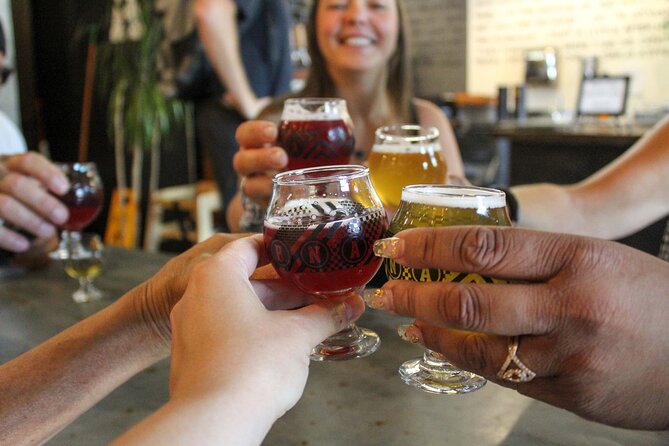 Kelowna: #1 Rated Walking Food Tour with 7 Tastings and 4 Drinks - Dolphins Statue and Waterfront Park: the Kelowna stories in between bites