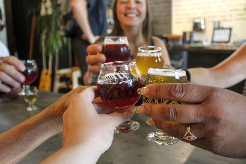 Kelowna: Walking Food Tour with 7 Tastings and 4 Drinks - Pace, distance, and the rain-or-shine reality